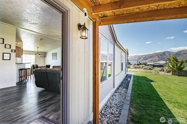 a view of a patio and wooden floor