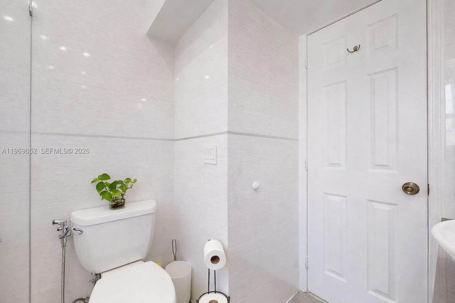 1611 Southwest 21st Street Miami, FL 33145 - Photo 20 of 59 a bathroom with a toilet and a shower