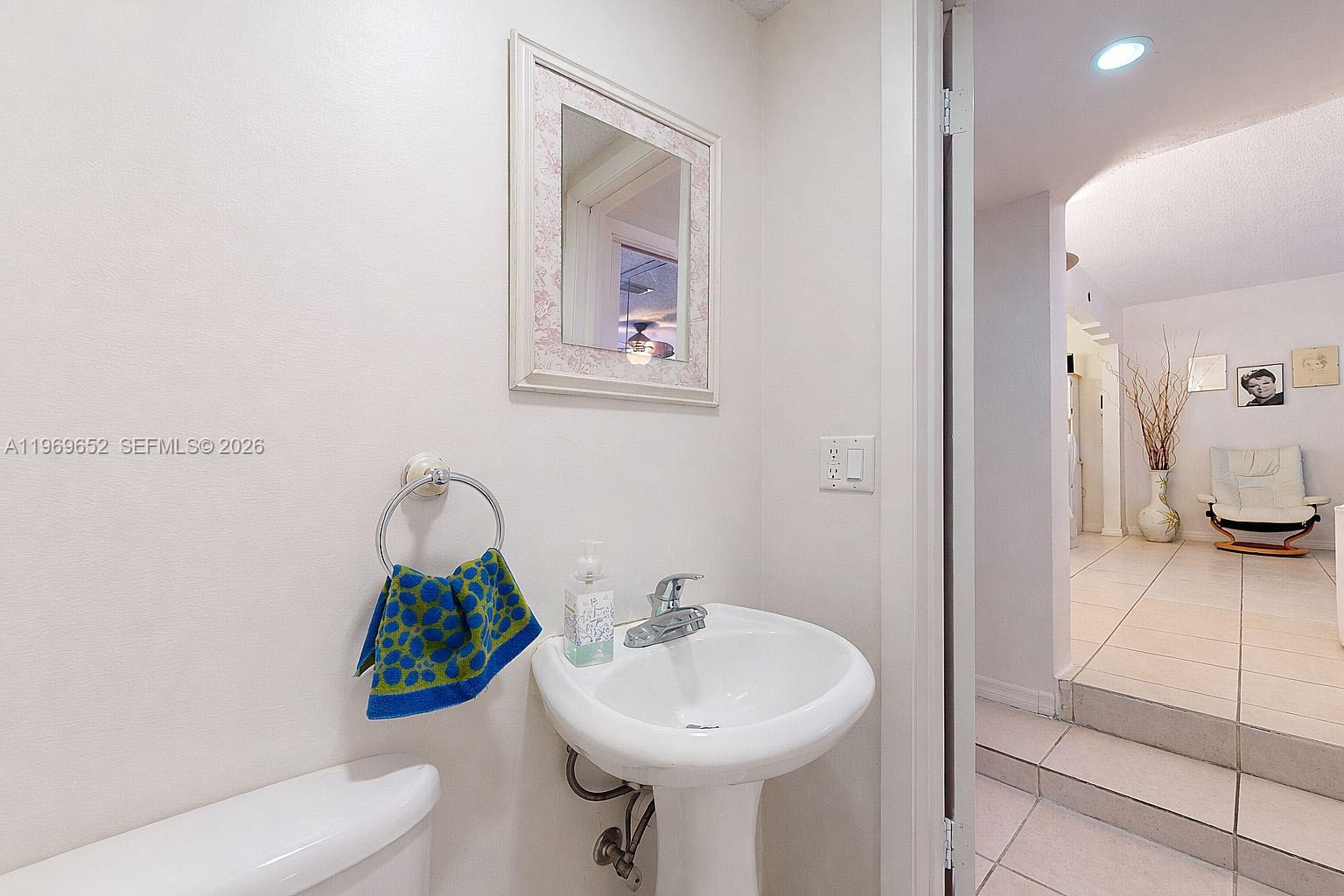 1611 Southwest 21st Street Miami, FL 33145 - Photo 27 of 59 a bathroom with a sink toilet and shower
