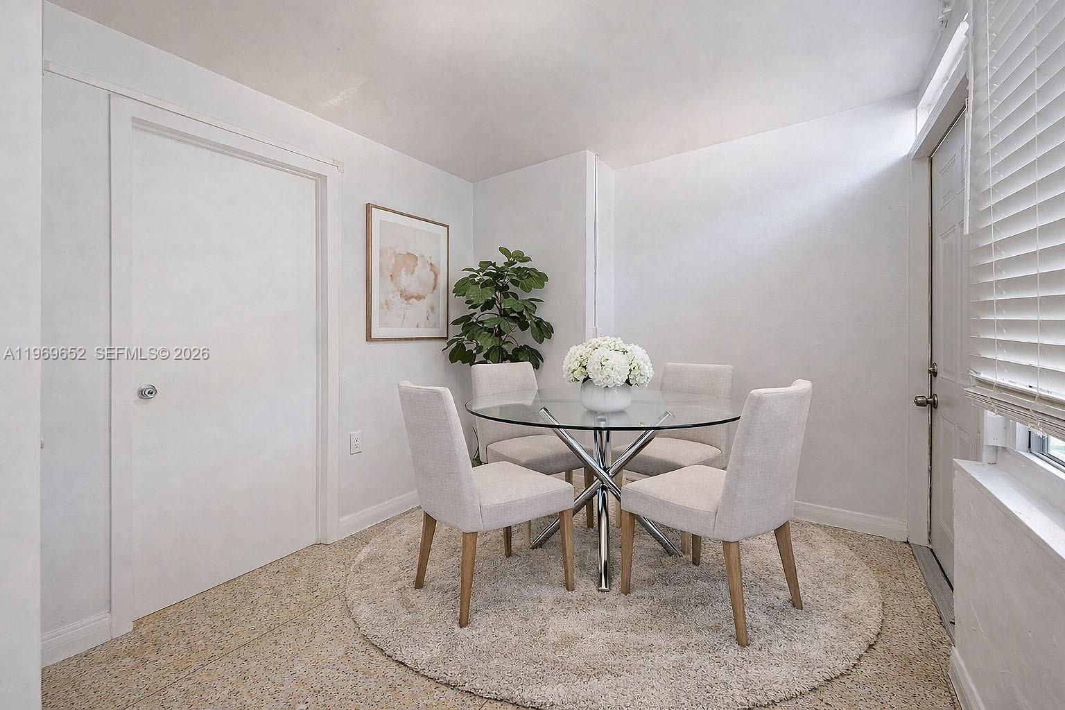 1611 Southwest 21st Street Miami, FL 33145 - Photo 38 of 59 a dining room with furniture and wooden floor