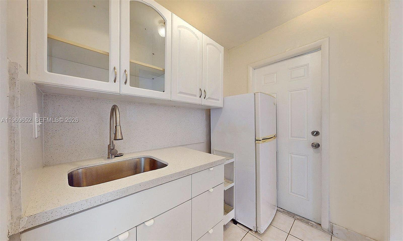 1611 Southwest 21st Street Miami, FL 33145 - Photo 46 of 59 a utility room with dryer and washer
