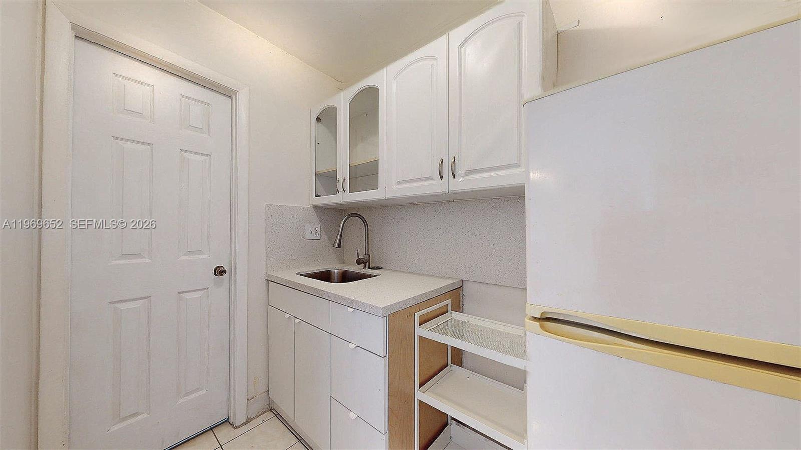 1611 Southwest 21st Street Miami, FL 33145 - Photo 47 of 59 a view of storage and utility room with washer and dryer