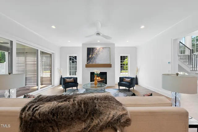 a bathroom with a double vanity sink mirror and shower