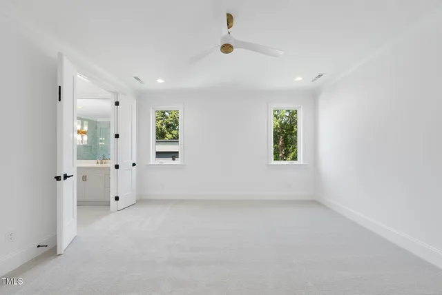 a bathroom with a bathtub shower sink and toilet