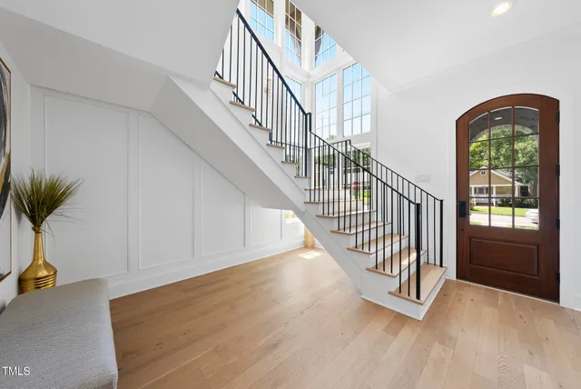 a kitchen with granite countertop a stove and a sink