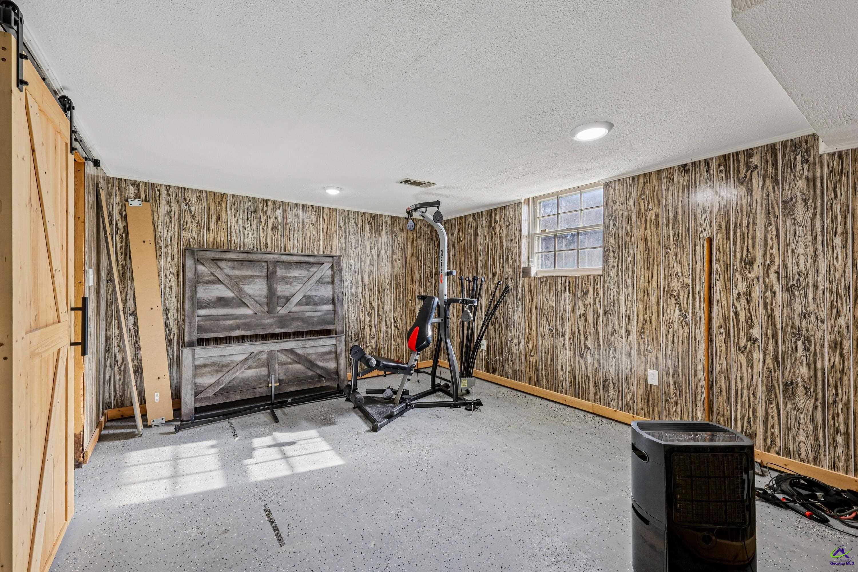 548 Greene Settlement Road Gray, GA 31032 - Photo 35 of 68 a view of a room with gym equipment