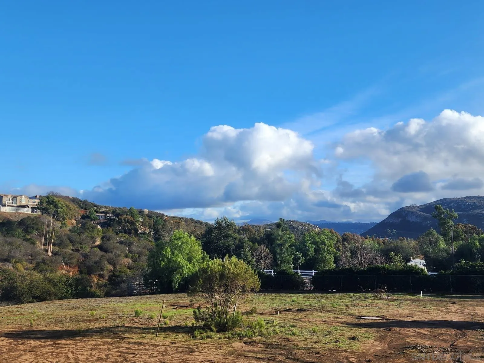 10041 Dunbar Lane, Unit 1 El Cajon, CA 92021 - Photo 4 of 14 a view of a lake with a mountain in the background