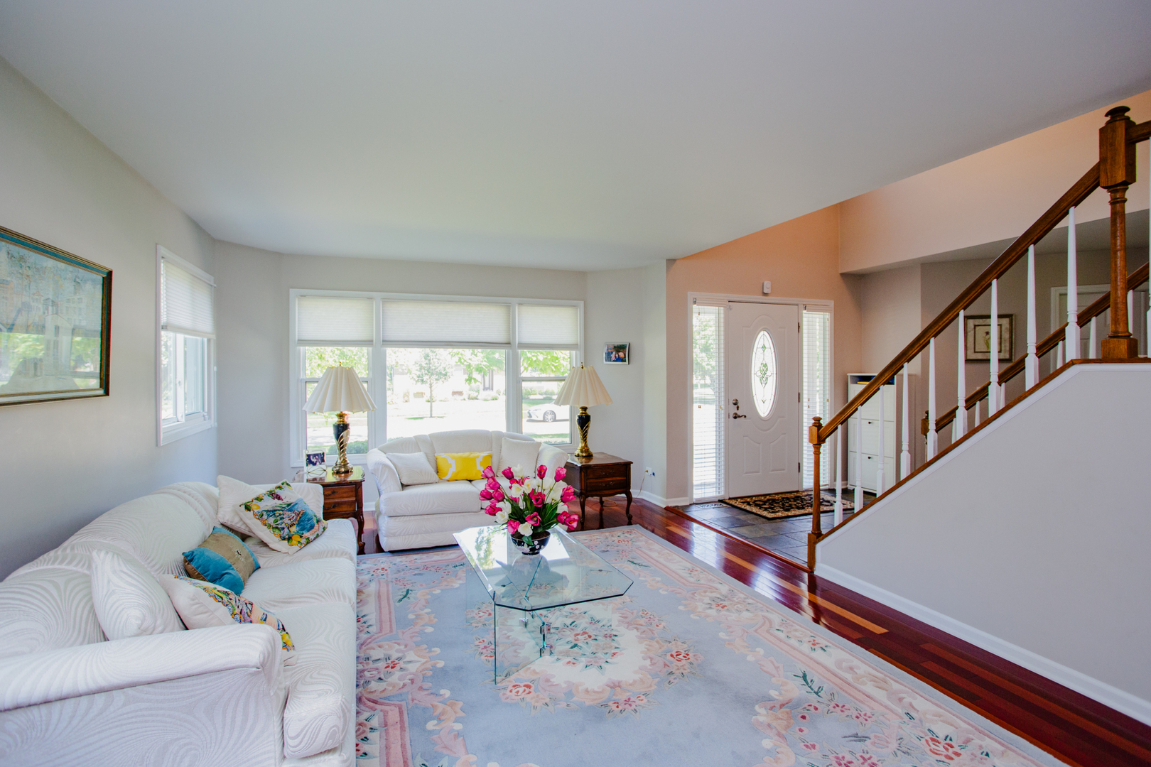 608 Raintree Road Buffalo Grove, IL 60089 - Photo 17 of 59 a living room with furniture and a large window