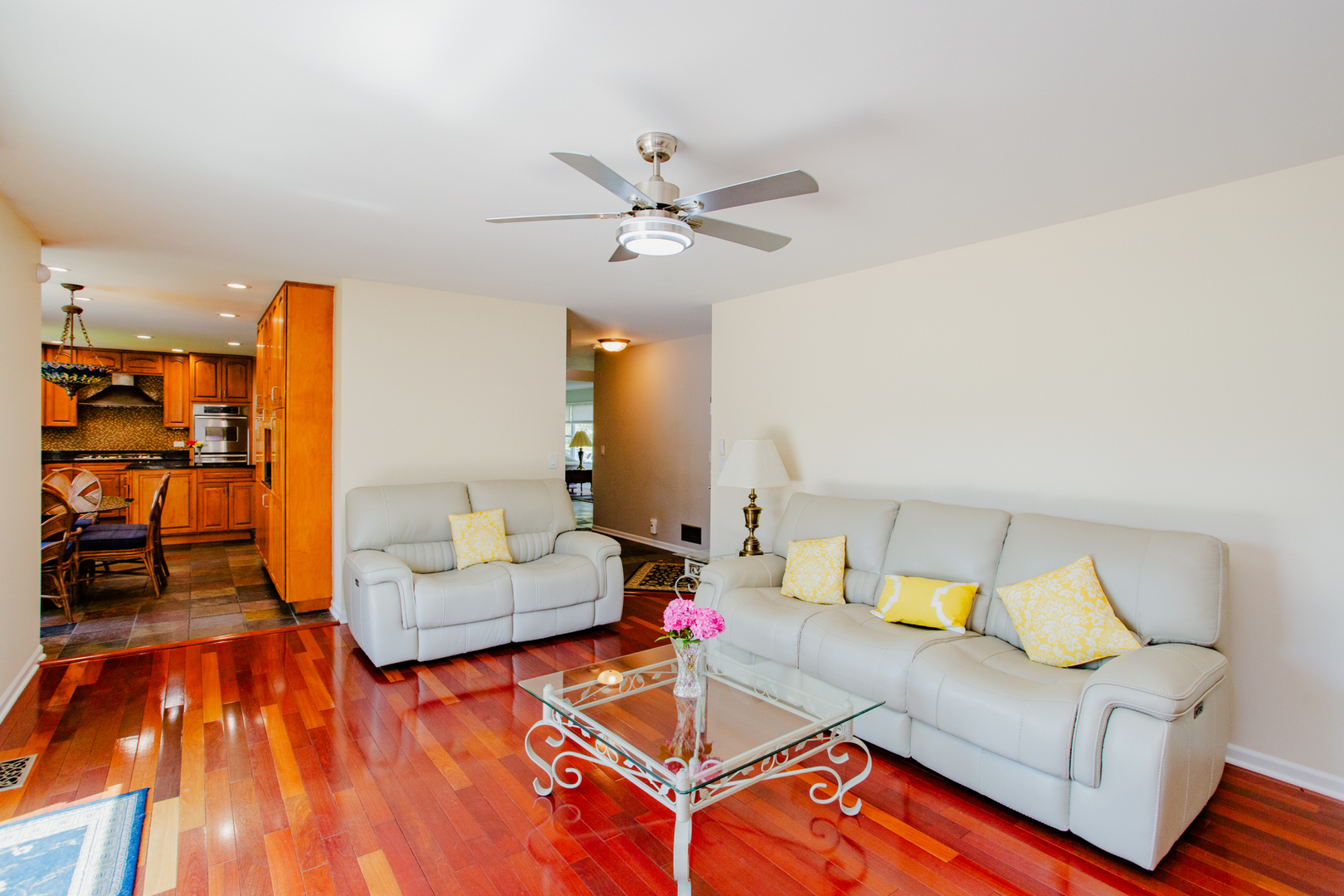 608 Raintree Road Buffalo Grove, IL 60089 - Photo 23 of 59 a living room with furniture and wooden floor