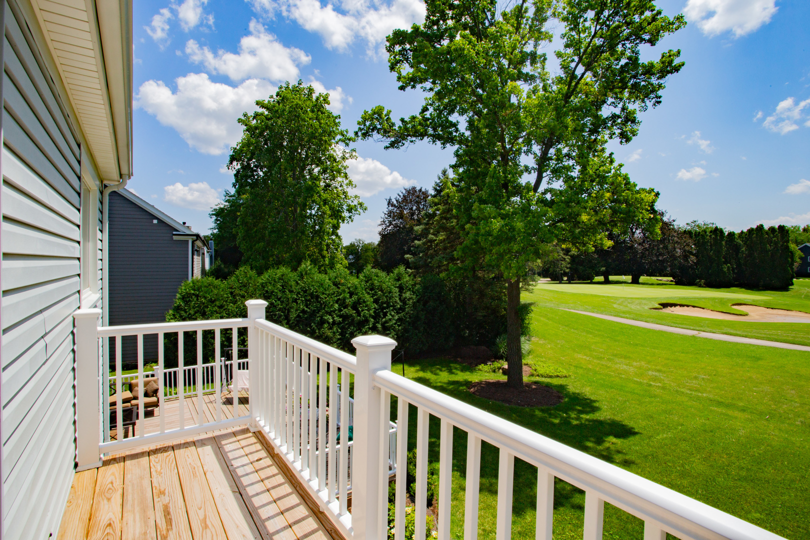 608 Raintree Road Buffalo Grove, IL 60089 - Photo 48 of 59 a view of a balcony with a garden