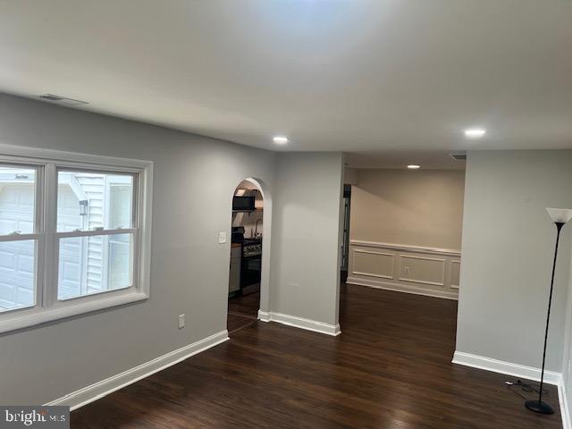 1410 Colchester Road Woodbridge, VA 22191 - Photo 5 of 19 an empty room with wooden floor and windows
