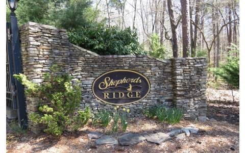 Lot 38 Shepherds Way Morganton, GA 30560 - Photo 3 of 4 a sign that is on the side of a road
