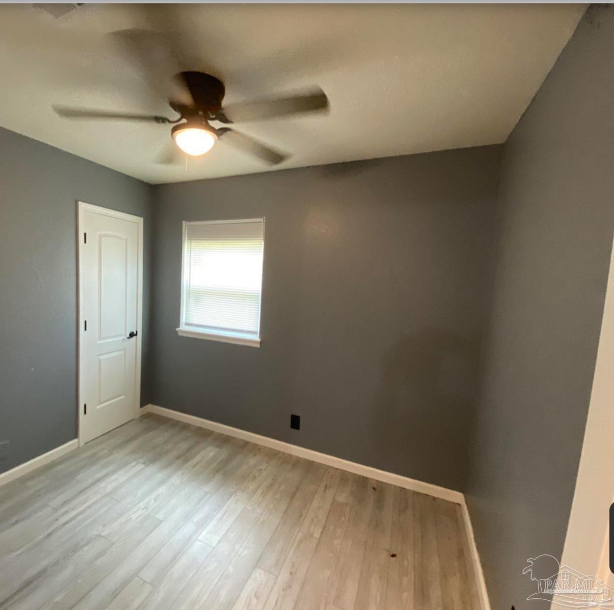 902 Decatur Avenue Pensacola, FL 32507 - Photo 8 of 10 a view of room with window and ceiling fan