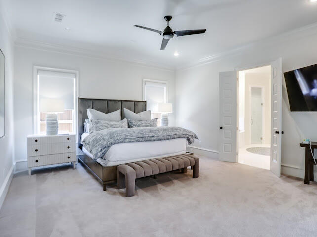 4805 116th Street Lubbock, TX 79424 - Photo 15 of 57 a spacious bedroom with a bed and a flat tv screen on the dresser