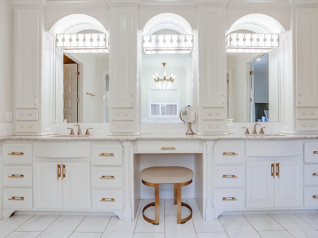 4805 116th Street Lubbock, TX 79424 - Photo 17 of 57 a bathroom with a sink and a mirror