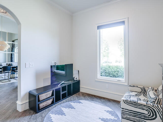 4805 116th Street Lubbock, TX 79424 - Photo 23 of 57 a living room with furniture and a window