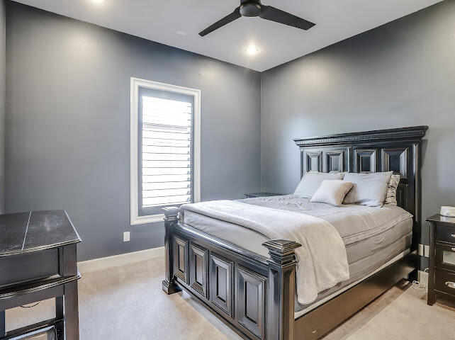 4805 116th Street Lubbock, TX 79424 - Photo 27 of 57 a bedroom with a bed and a window