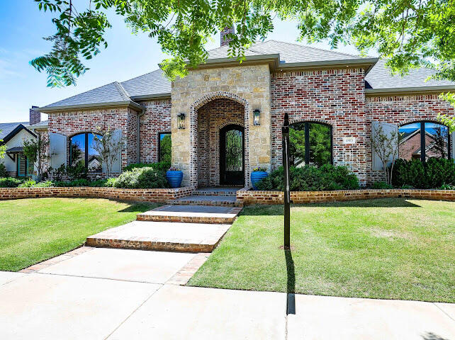 4805 116th Street Lubbock, TX 79424 - Photo 3 of 57 a view of a house with garden