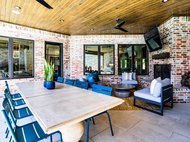 4805 116th Street Lubbock, TX 79424 - Photo 43 of 57 a view of a patio with a table and chairs