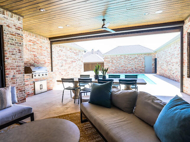 4805 116th Street Lubbock, TX 79424 - Photo 45 of 57 a living room with furniture and a large window