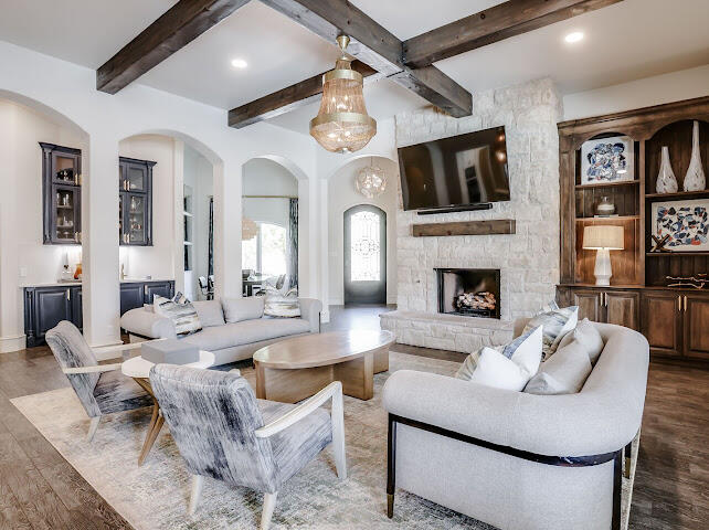 4805 116th Street Lubbock, TX 79424 - Photo 5 of 57 a living room with fireplace furniture and a fireplace