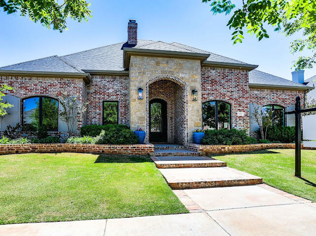 4805 116th Street Lubbock, TX 79424 - Photo 57 of 57 a front view of a house with a yard