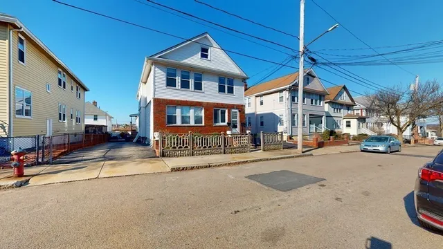 a view of a street with cars