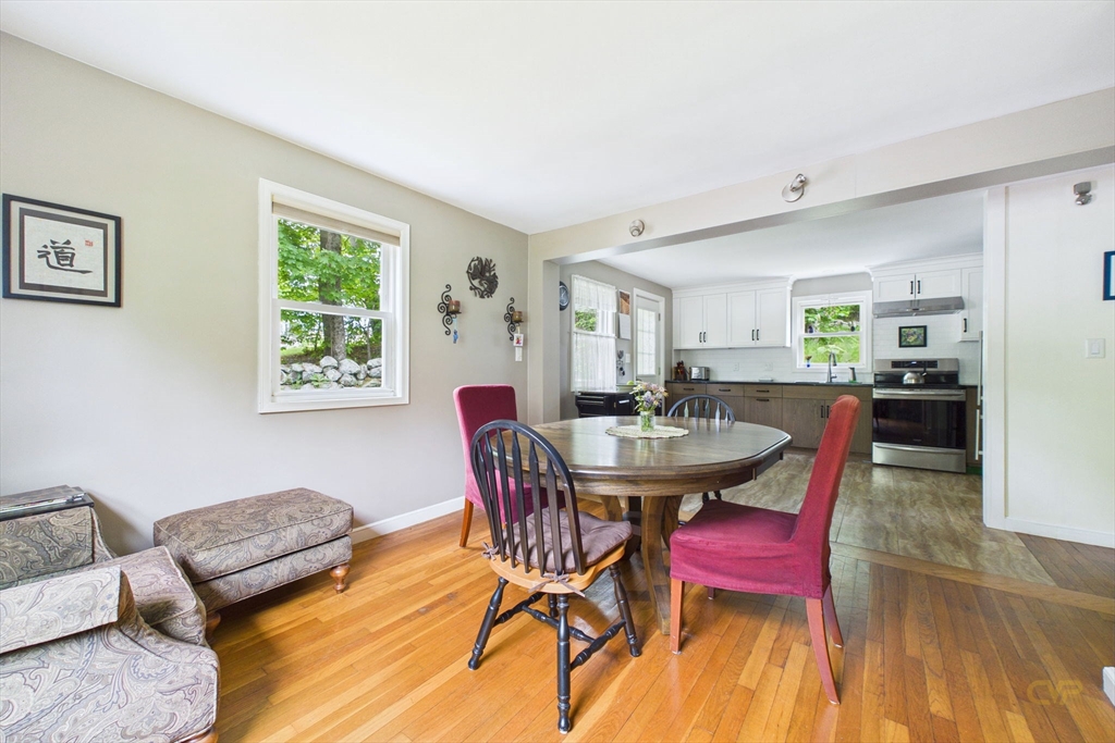 70 Neponset Street Canton, MA 02021 - Photo 19 of 39 a view of a dining room with furniture and wooden floor