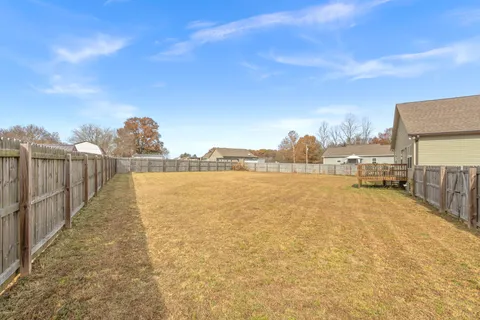 a house view with a lake