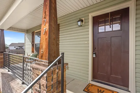 a view of balcony with furniture