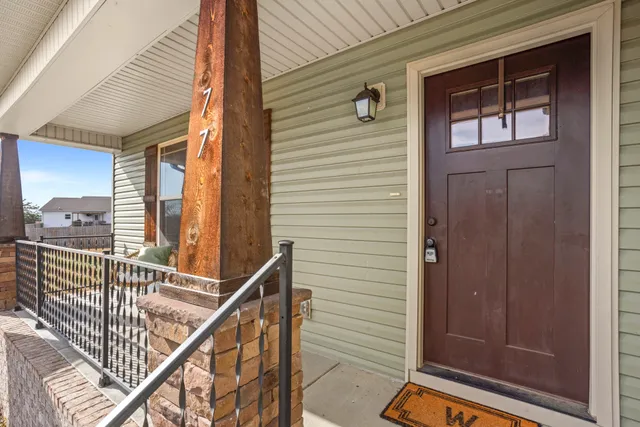 a view of balcony with furniture