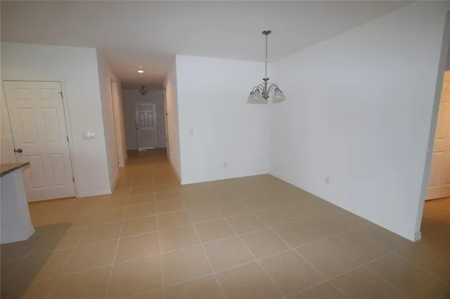 a view of a room with an empty space