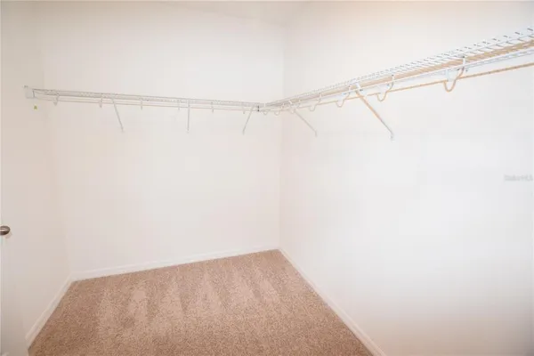 a view of small space with racks on the wall