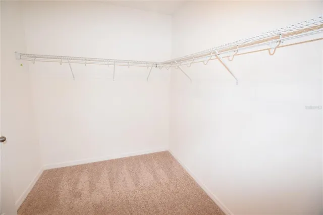 a view of small space with racks on the wall