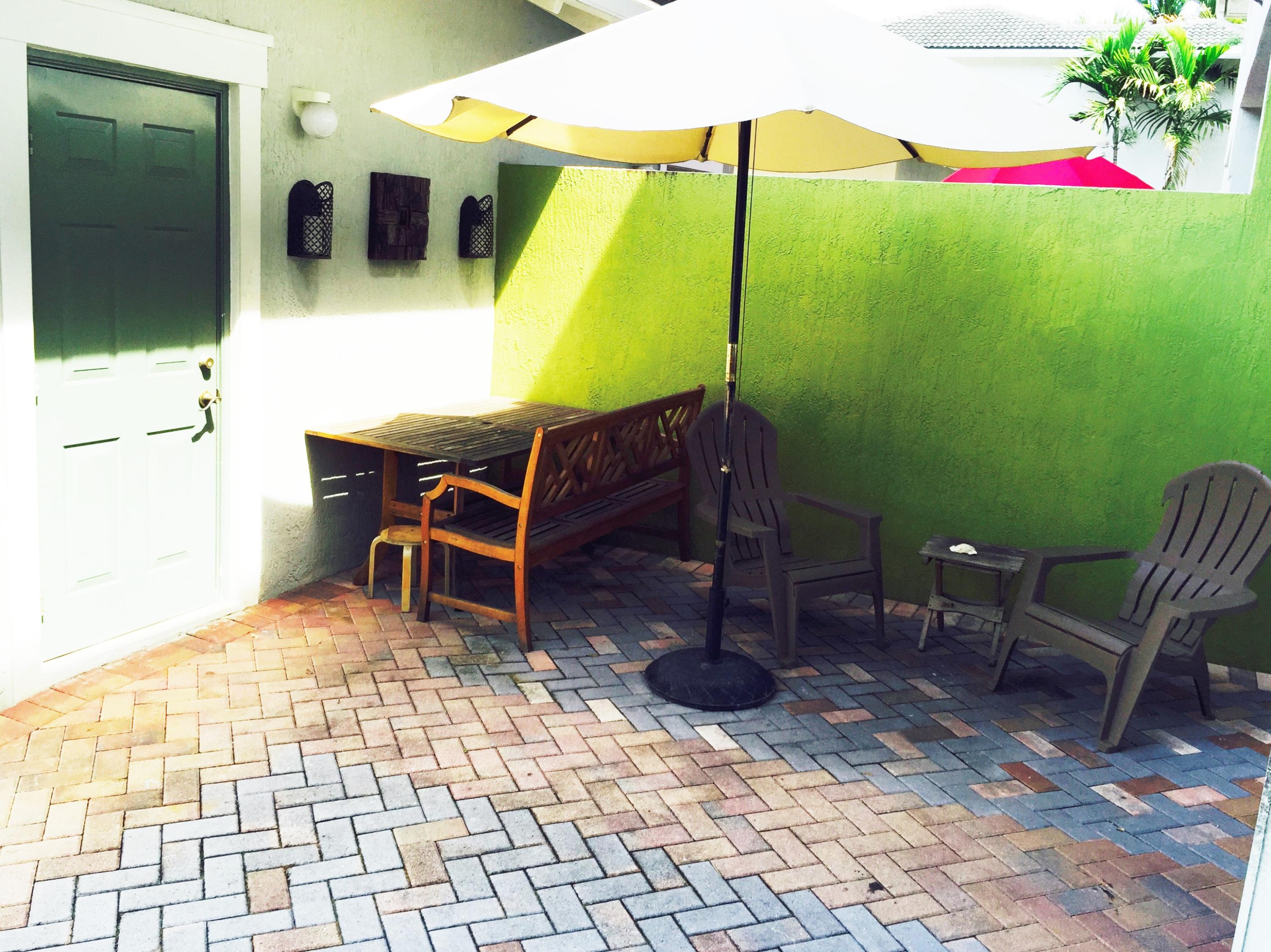 997 Northwest 18th Avenue Boca Raton, FL 33431 - Photo 18 of 27 Patio facing detached garage