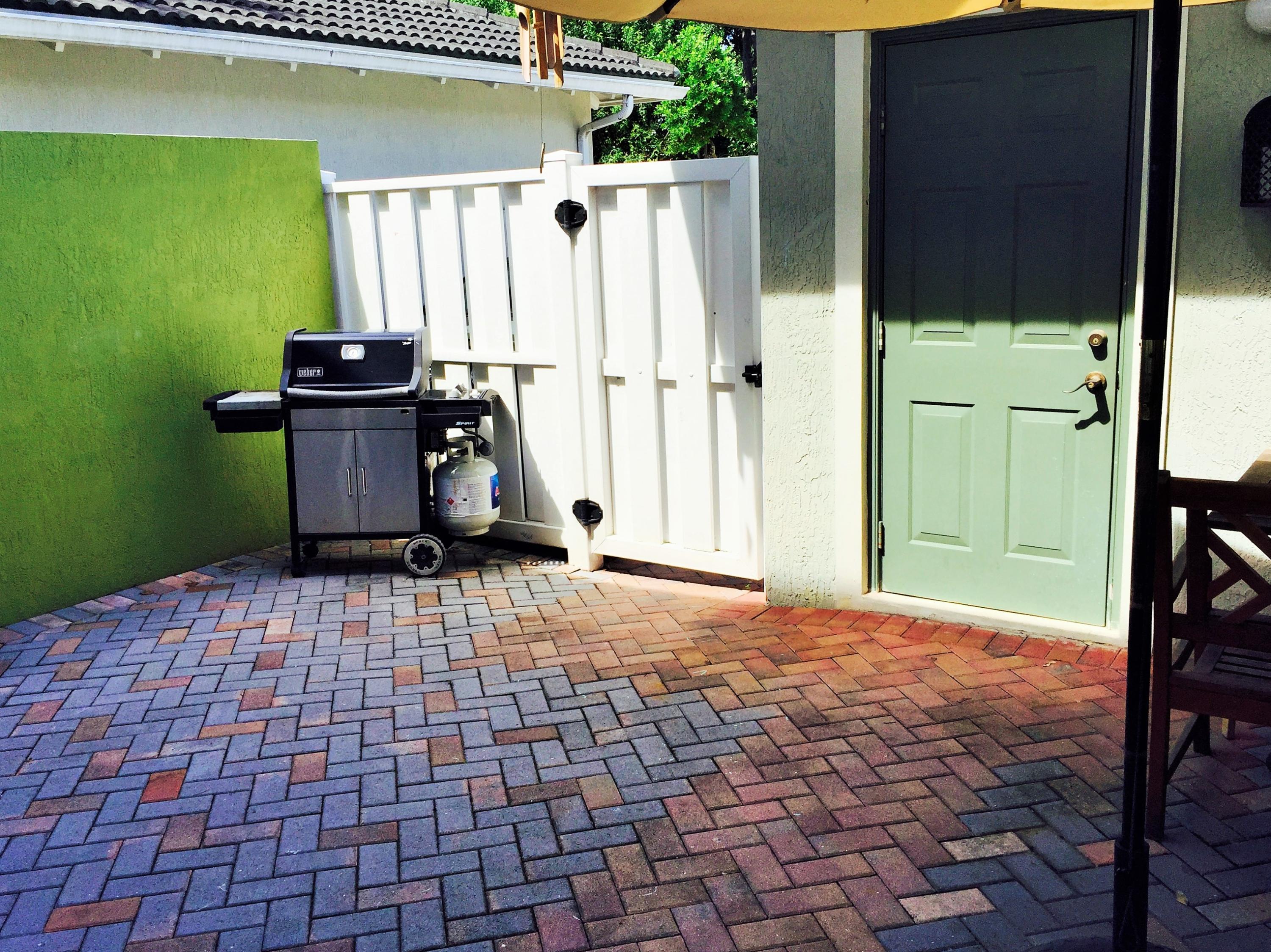 997 Northwest 18th Avenue Boca Raton, FL 33431 - Photo 19 of 27 Patio facing detached garage