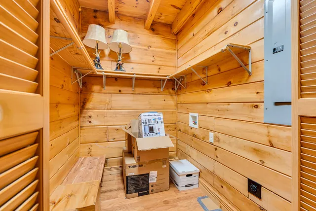 a bathroom with blue shower