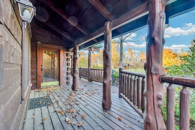 a view of outdoor space with wooden floor