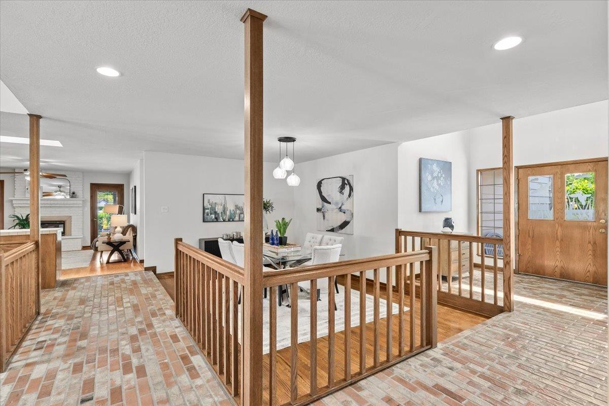5726 Shelldrake Court Stockton, CA 95207 - Photo 14 of 89 a view of a hallway with wooden floor and windows
