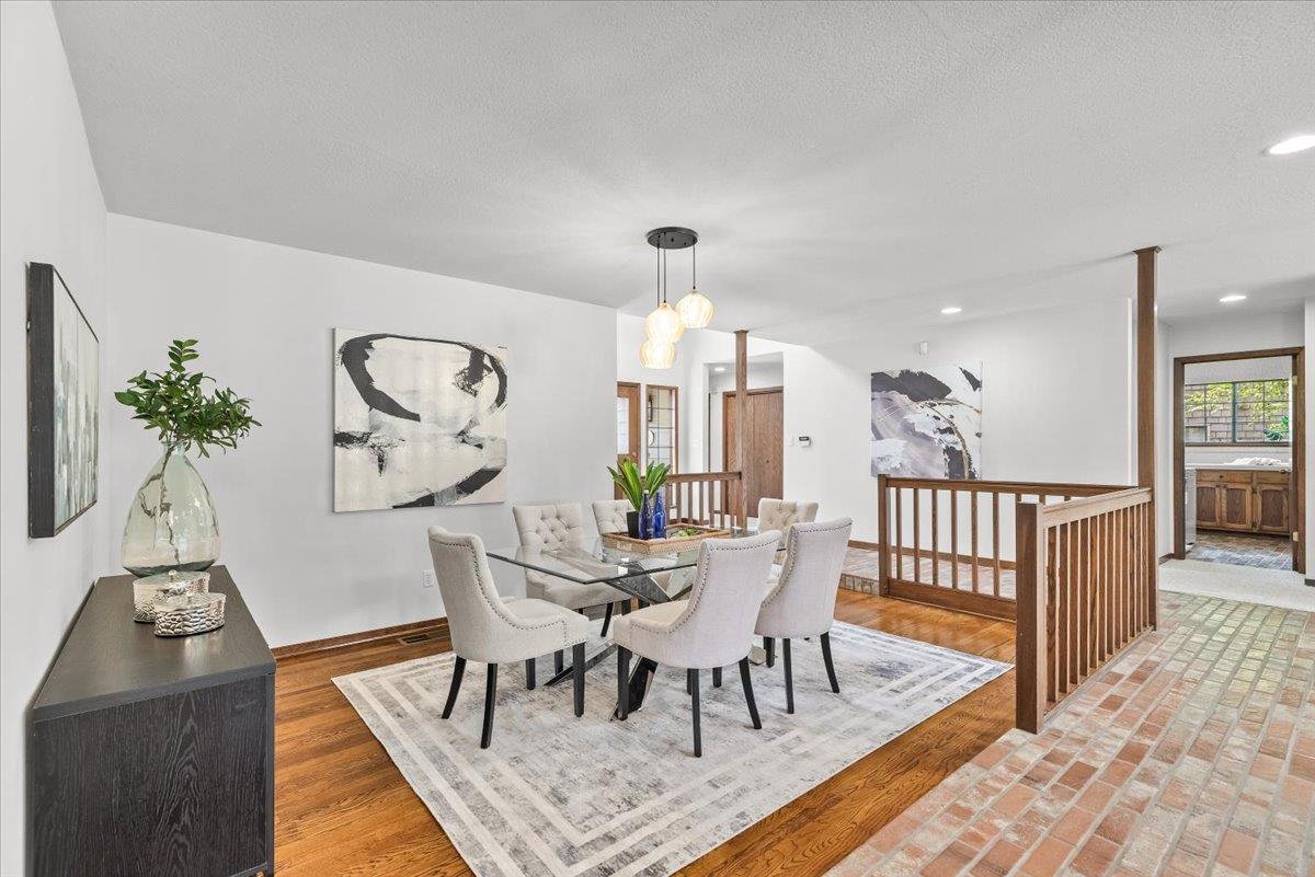 5726 Shelldrake Court Stockton, CA 95207 - Photo 16 of 89 a view of a dining room with furniture and wooden floor