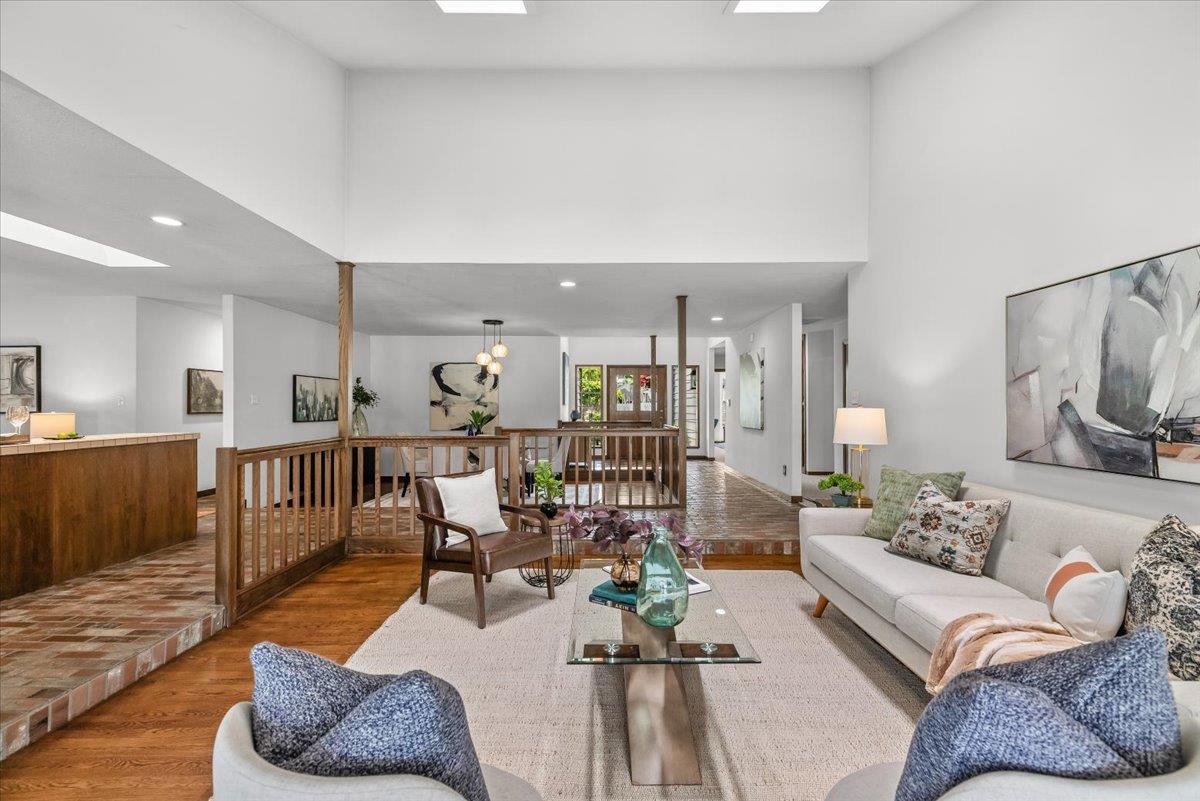 5726 Shelldrake Court Stockton, CA 95207 - Photo 25 of 89 a living room with furniture kitchen view and a wooden floor