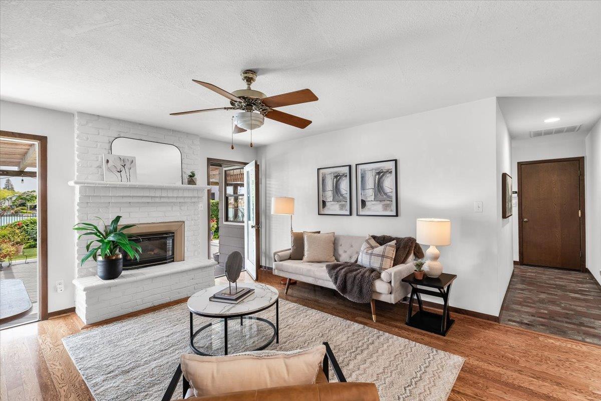 5726 Shelldrake Court Stockton, CA 95207 - Photo 32 of 89 a living room with furniture and a fireplace