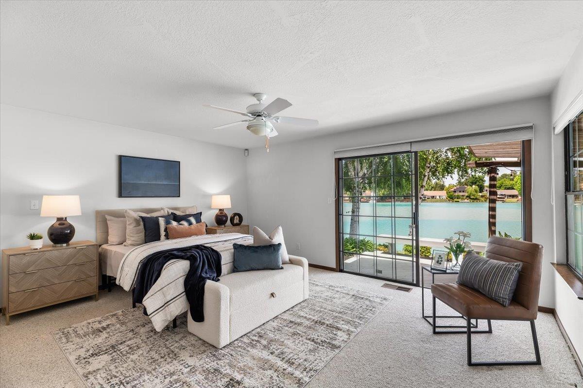 5726 Shelldrake Court Stockton, CA 95207 - Photo 57 of 89 a living room with furniture and a flat screen tv