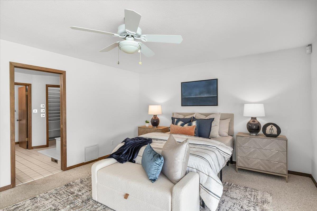 5726 Shelldrake Court Stockton, CA 95207 - Photo 60 of 89 a bedroom with a bed and wooden floor