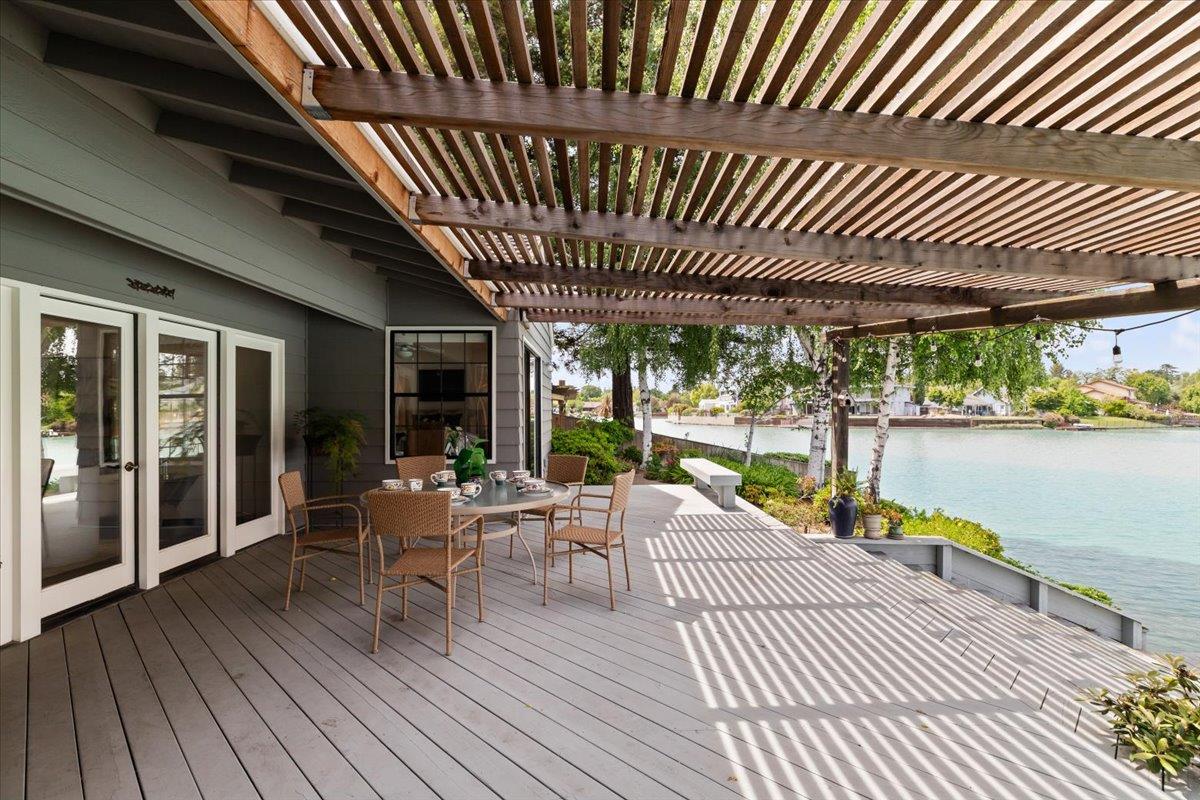 5726 Shelldrake Court Stockton, CA 95207 - Photo 75 of 89 a view of a patio with swimming pool table and chairs