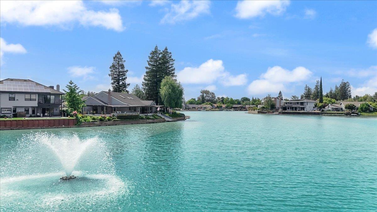 5726 Shelldrake Court Stockton, CA 95207 - Photo 81 of 89 a view of a lake with houses