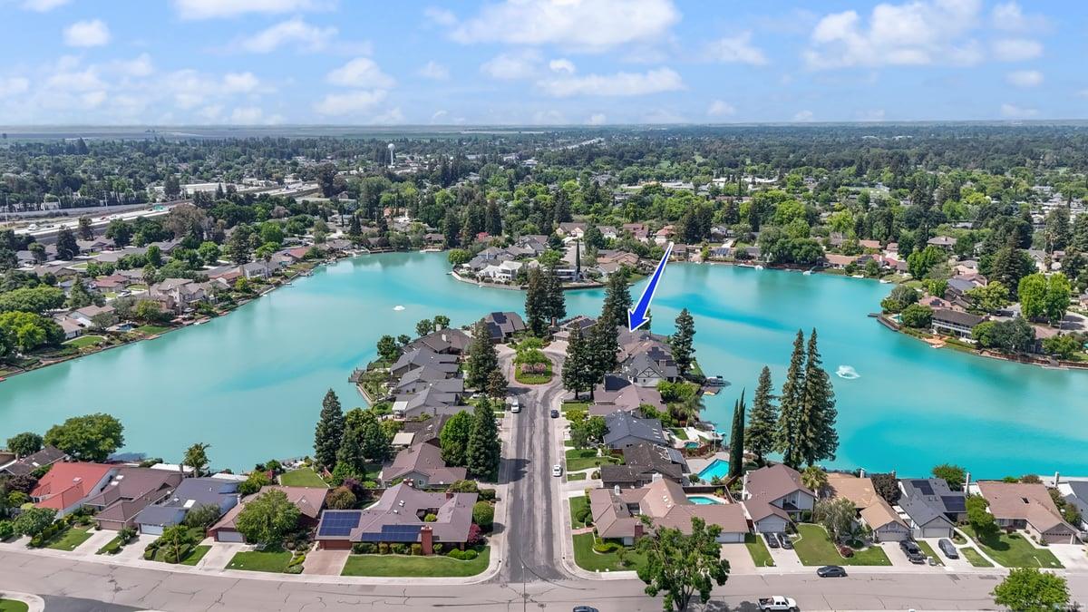 5726 Shelldrake Court Stockton, CA 95207 - Photo 84 of 89 an aerial view of lake and residential houses with outdoor space