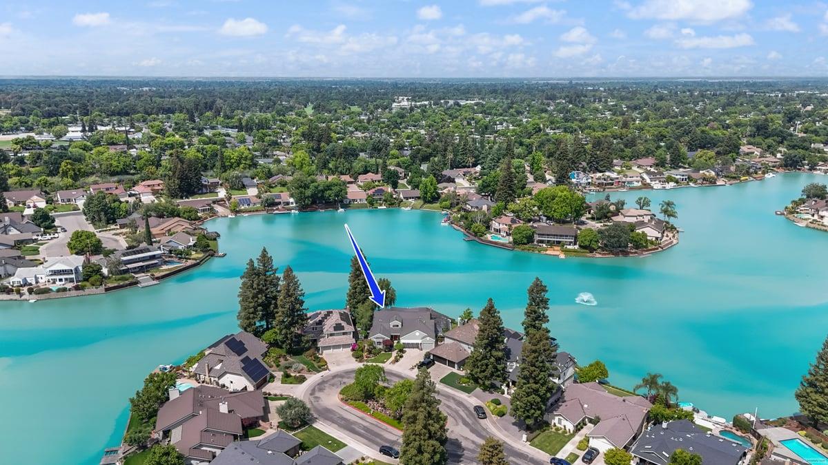 5726 Shelldrake Court Stockton, CA 95207 - Photo 85 of 89 an aerial view of a houses with a lake view