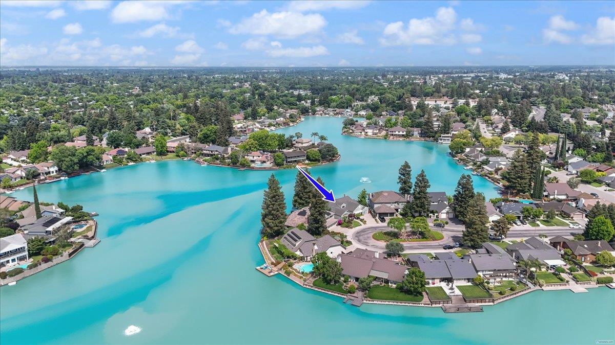 5726 Shelldrake Court Stockton, CA 95207 - Photo 86 of 89 an aerial view of a house with a lake view