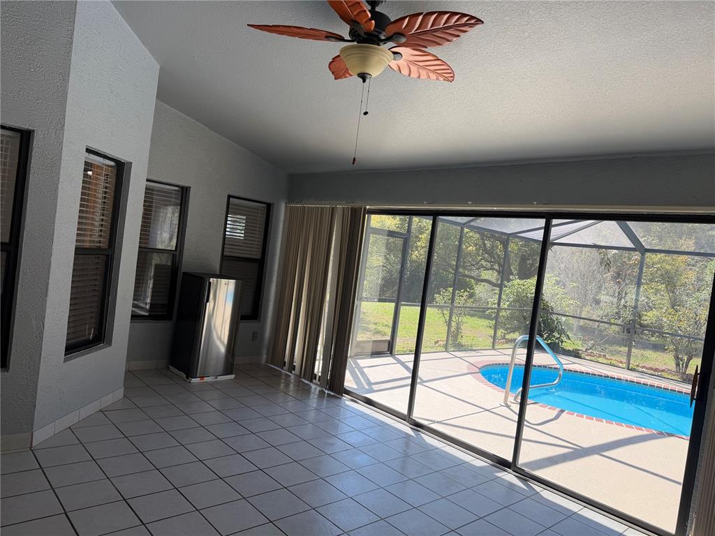 994 East Crown Of Roses Loop Inverness, FL 34453 - Photo 16 of 20 a view of an entryway with a floor to ceiling window